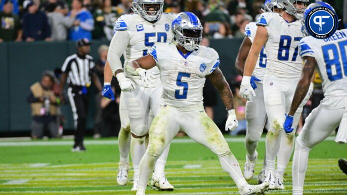 Detroit Lions running back David Montgomery (5) reacts after scoring a touchdown in the fourth quarter against the Green Bay Packers at Lambeau Field.