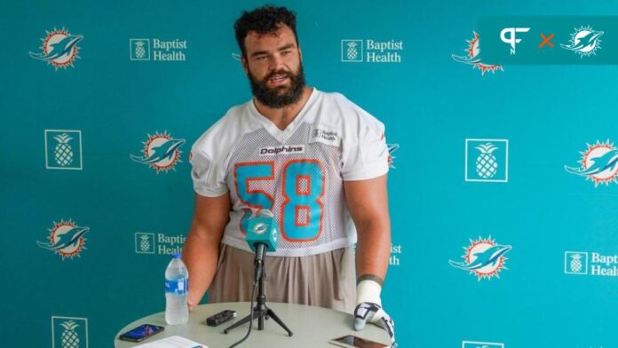 Dolphins orange jersey for practice player of the day tracker