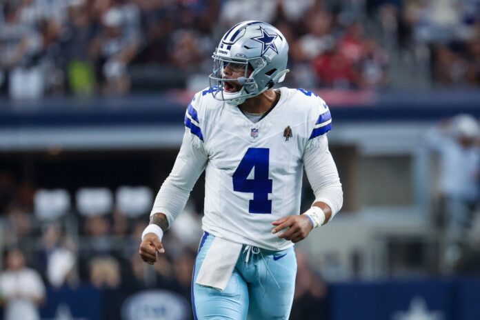 Dallas Cowboys quarterback Dak Prescott looks to throw during a