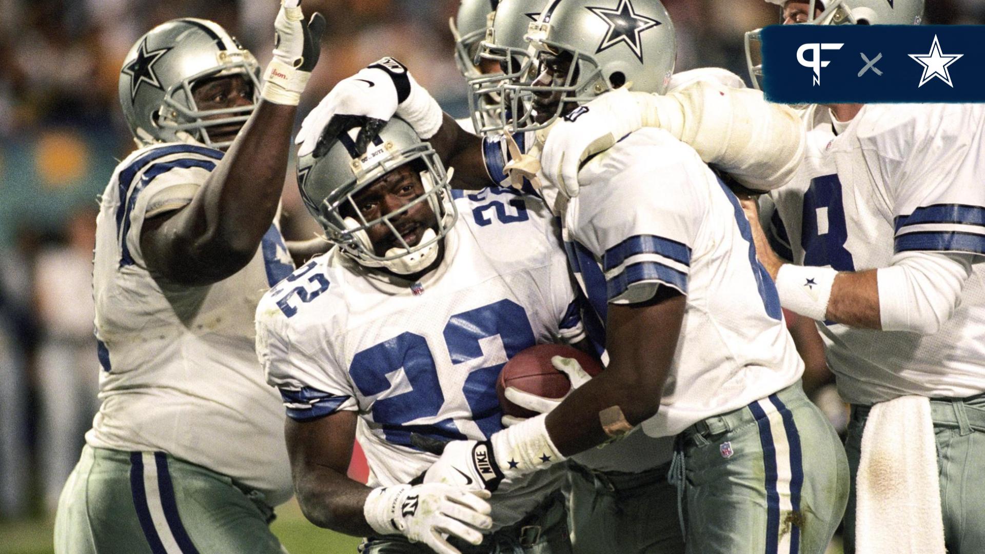 Emmitt Smith of the Dallas Cowboys carries the ball against the
