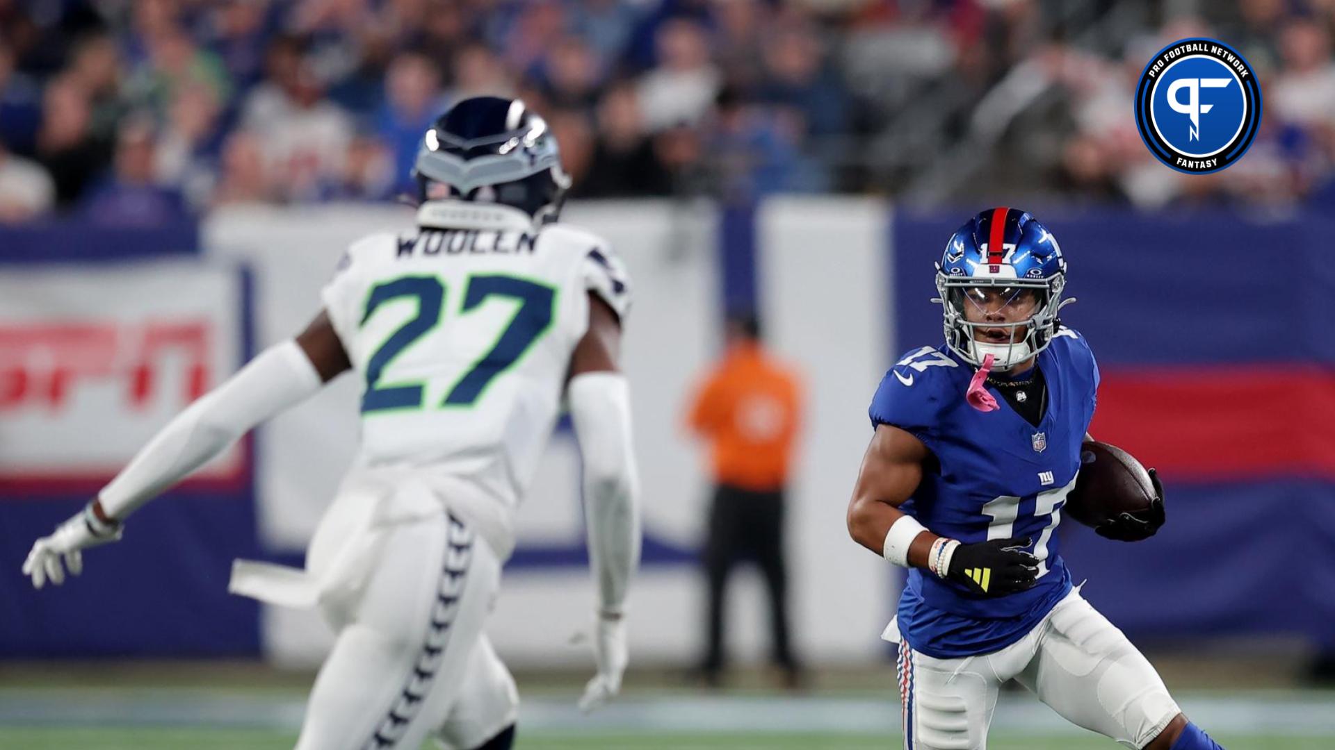 New York Giants WR Wan'Dale Robinson (17) runs with the ball against the Seattle Seahawks.