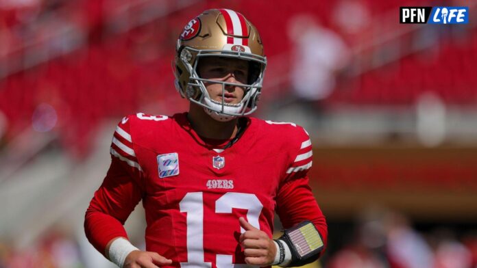 San Francisco 49ers quarterback Brock Purdy warms up before the