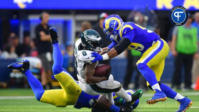 Los Angeles Rams DT Aaron Donald tackles Philadelphia Eagles RB D'Andre Swift.