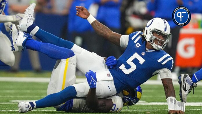 Indianapolis Colts QB Anthony Richardson (5) gets rid of the ball before being tackled against the Los Angeles Rams.