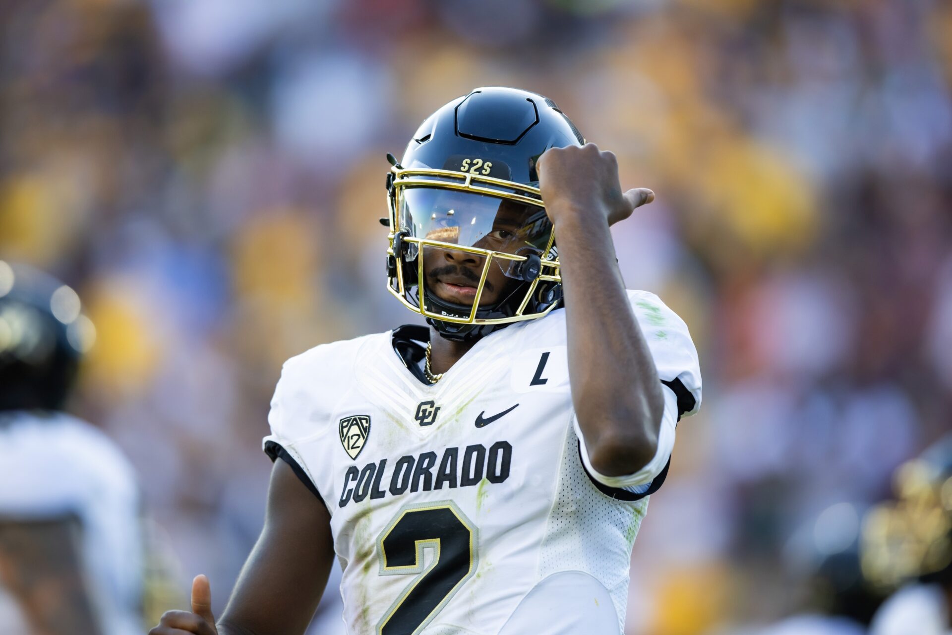 Shedeur Sanders (2) celebrates after scoring a touchdown against the Arizona State Sun Devils in the first half at Mountain America Stadium, Home of the ASU Sun Devils.