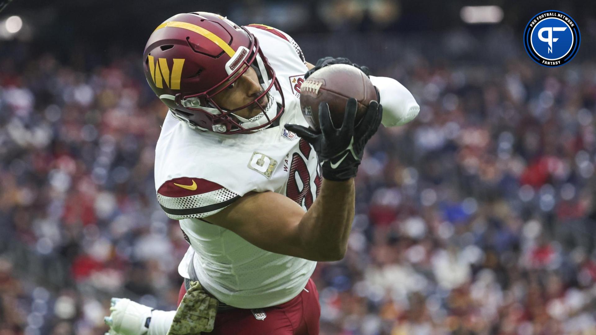 Washington Commanders tight end Logan Thomas (82) runs during an