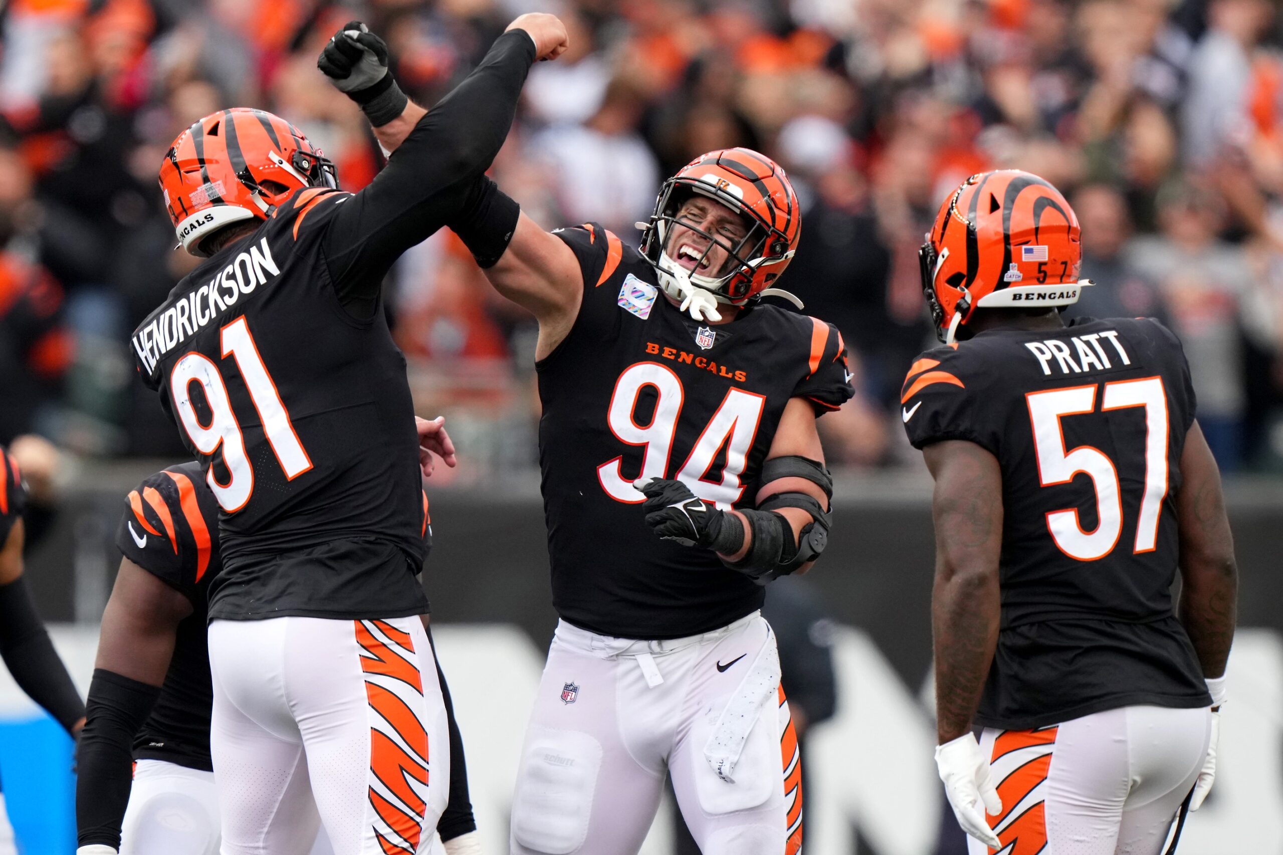 Trey Hendrickson (91) and Cincinnati Bengals defensive end Sam Hubbard (94) celebrate a sack in the fourth quarter during an NFL football game between the Seattle Seahawks and the Cincinnati Bengals Sunday, Oct. 15, 2023, at Paycor Stadium.