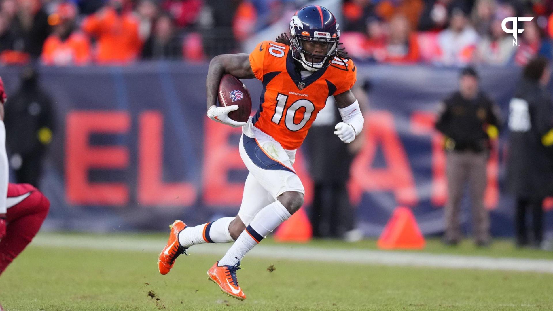 Jerry Jeudy (10) runs after a reception in the second half against the Arizona Cardinals at Empower Field at Mile High.
