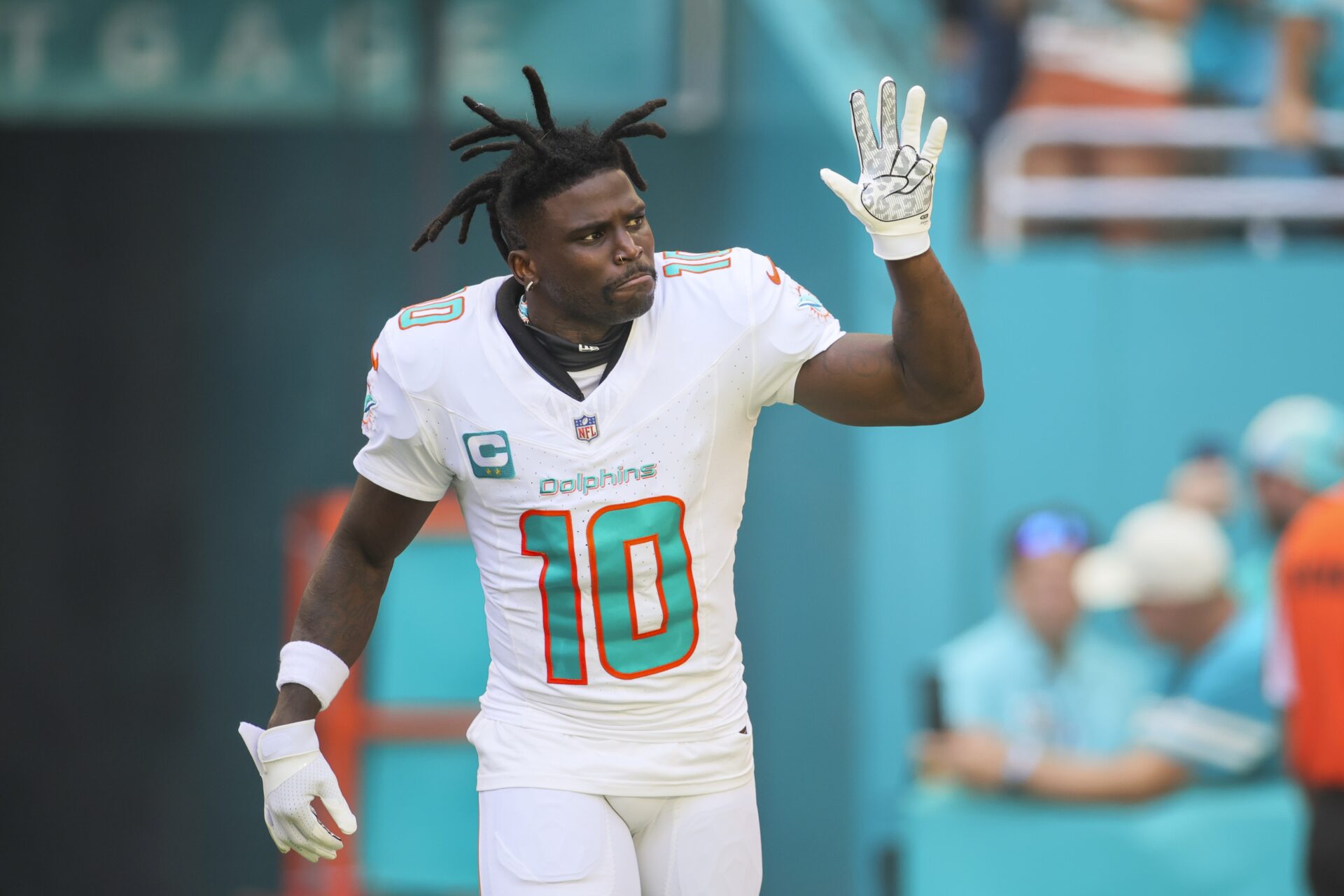 Miami Dolphins WR Tyreek Hill (10) gestures to the crowd before a game.