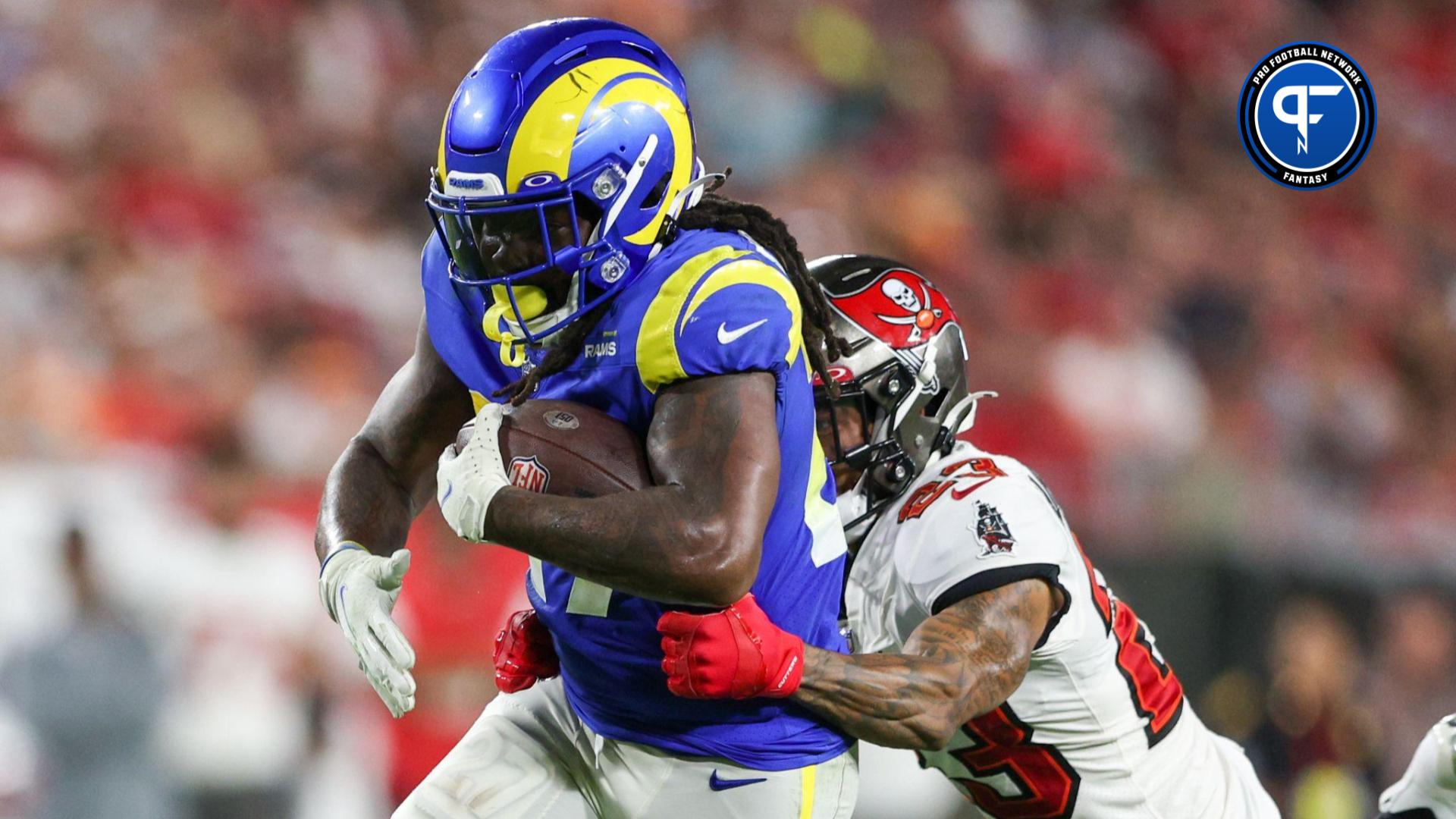Los Angeles Rams running back Darrell Henderson Jr. (27) is tackled by Tampa Bay Buccaneers cornerback Sean Murphy-Bunting (23) in the third quarter at Raymond James Stadium.