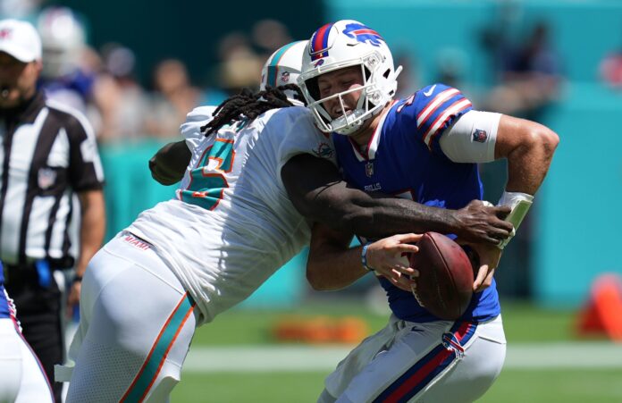 Miami Dolphins linebacker Melvin Ingram (6) sacks Buffalo Bills quarterback Josh Allen