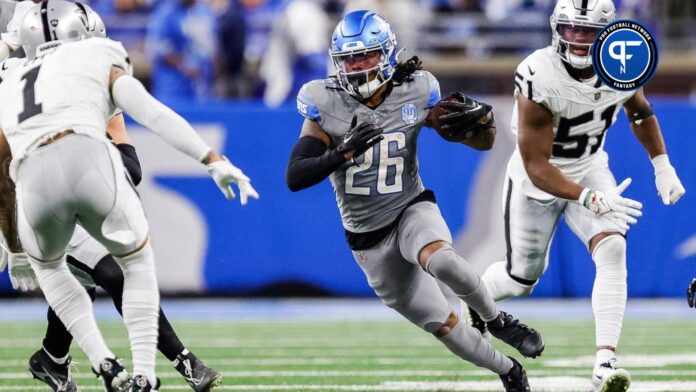 Detroit Lions running back Jahmyr Gibbs (26) runs against Las Vegas Raiders safety Marcus Epps (1) during the second half at Ford Field in Detroit on Monday, Oct. 30, 2023.