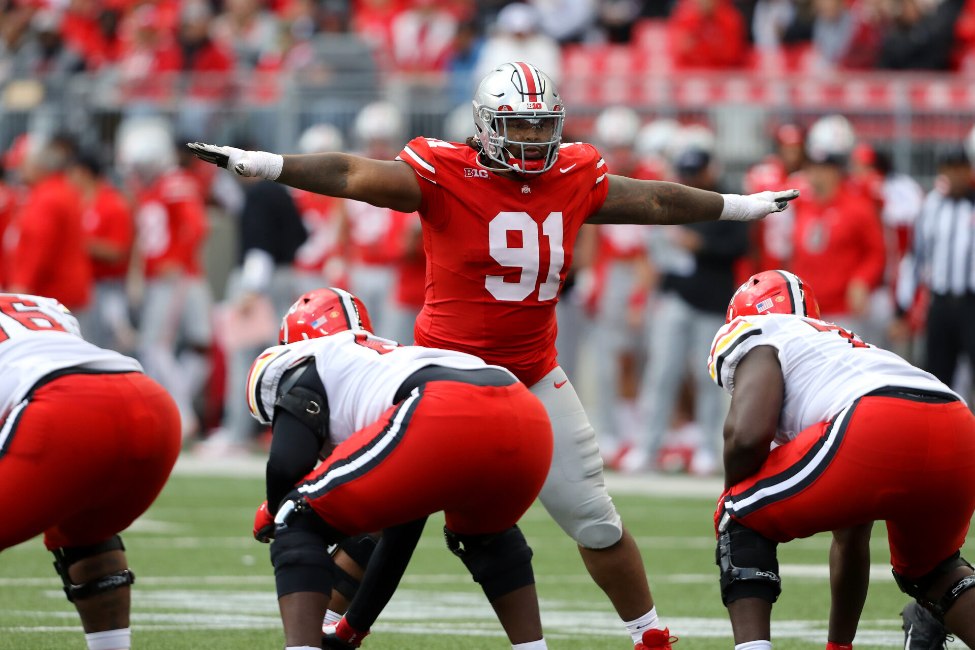 Ohio State Buckeyes defensive tackle Tyleik Williams (91) makes a call during the third quarter against the Maryland Terrapins at Ohio Stadium.