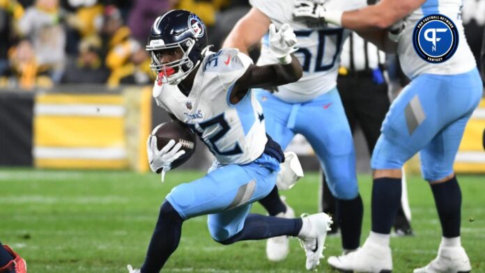 Tennessee Titans running back Tyjae Spears (32) is tackled by