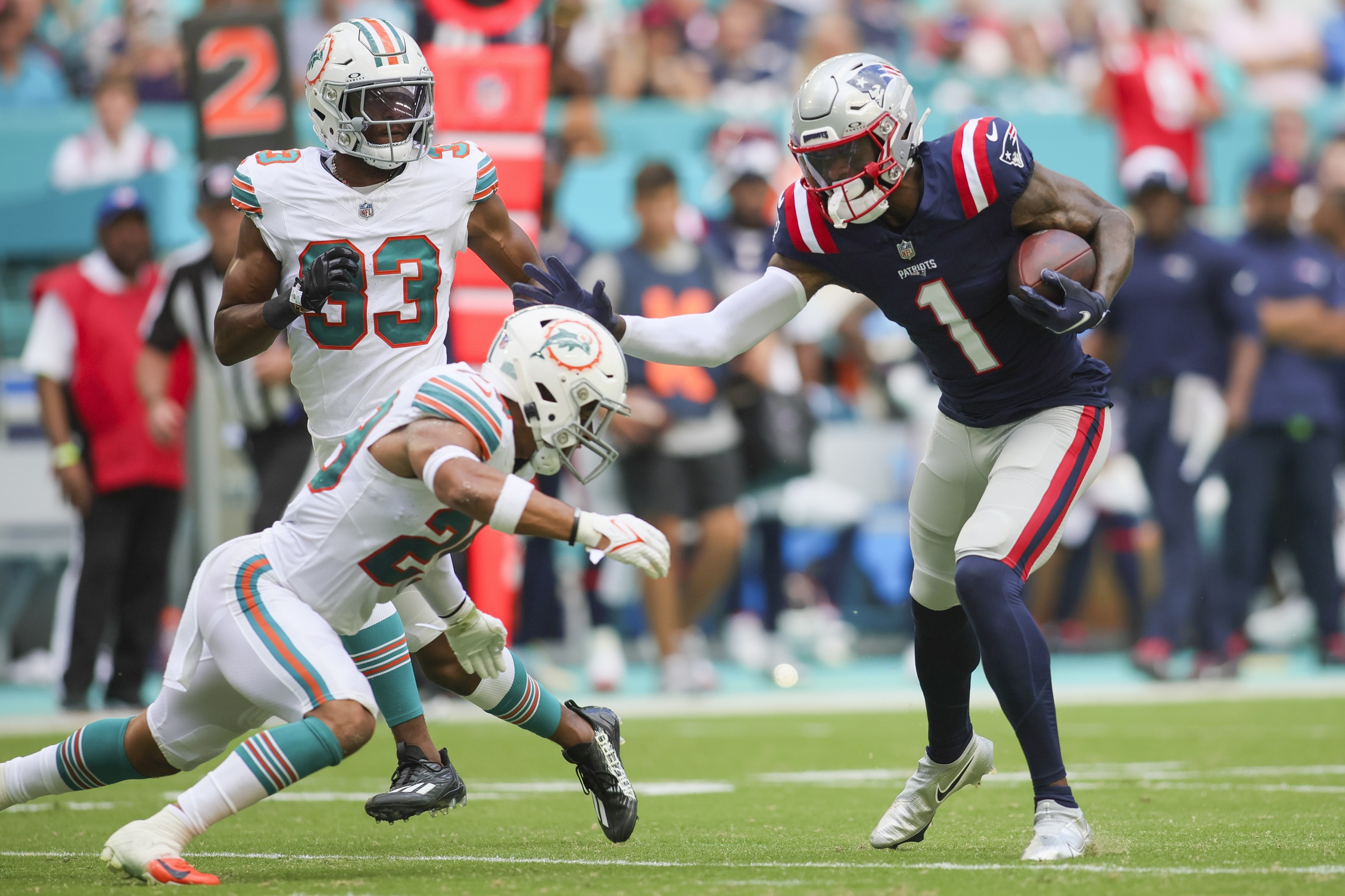 DeVante Parker (1) runs with the football against Miami Dolphins safety Brandon Jones (29) during the second quarter at Hard Rock Stadium.