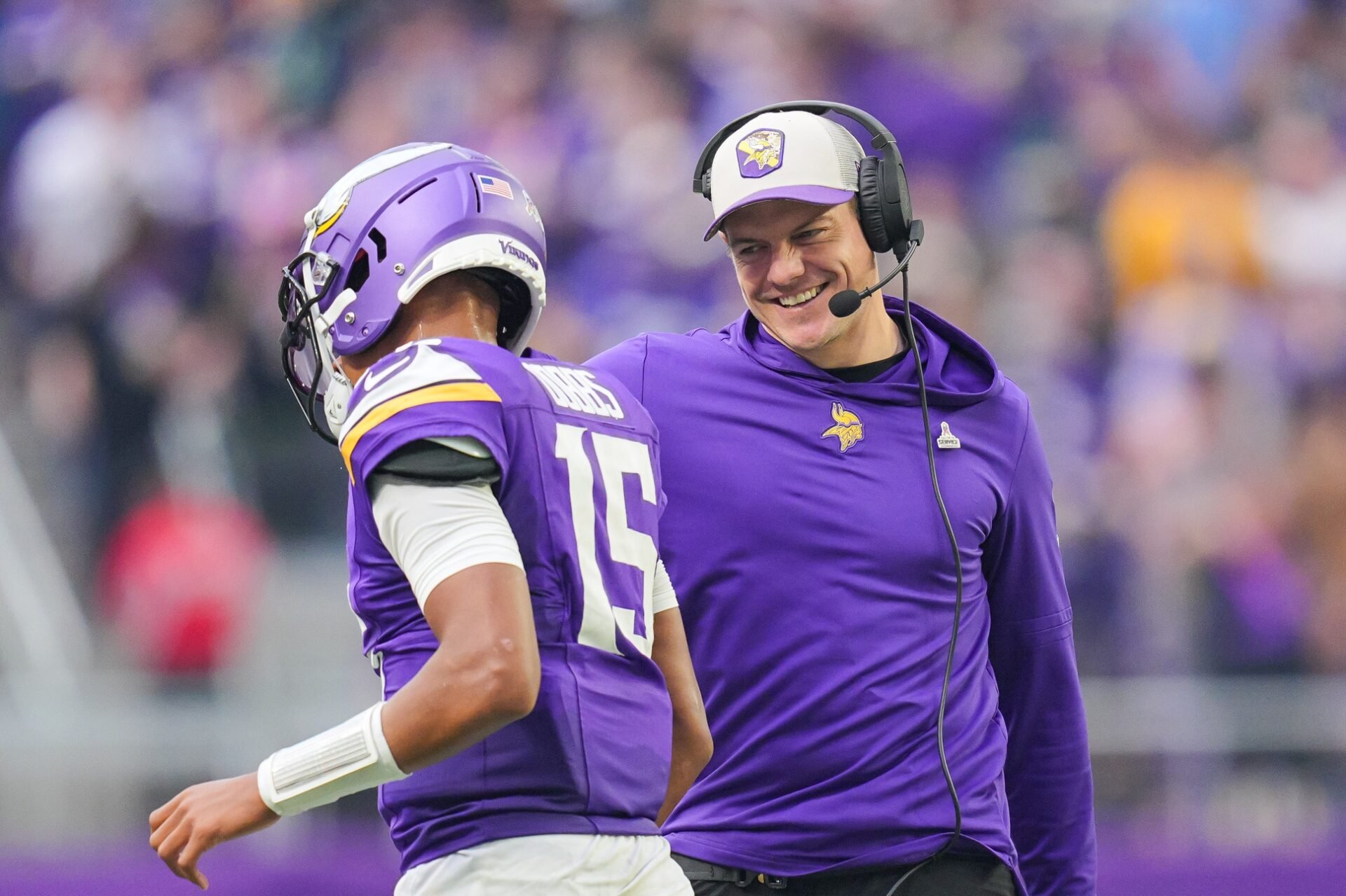 Minnesota Vikings head coach Kevin O'Connell celebrates with quarterback Joshua Dobbs (15) after a touchdown against the New Orleans Saints in the second quarter at U.S. Bank Stadium.