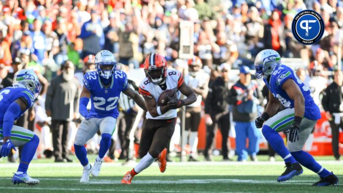Cleveland Browns wide receiver Elijah Moore (8) carries the ball against the Seattle Seahawks during the second half at Lumen Field.