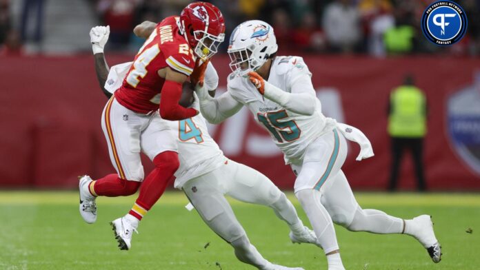Kansas City Chiefs wide receiver Skyy Moore (24) catches a pass defended by Miami Dolphins linebacker Jaelan Phillips (15) in the first quarter during an NFL International Series game.