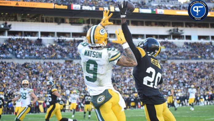 Green Bay Packers wide receiver Christian Watson (9) cannot make a catch against Pittsburgh Steelers cornerback Patrick Peterson (20).