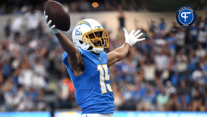 Los Angeles Chargers wide receiver Jalen Guyton (15) celebrates after scoring a touchdown against the Detroit Lions during the second half at SoFi Stadium.
