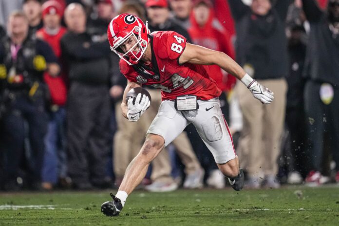 Georgia Bulldogs wide receiver Ladd McConkey (84) runs after a catch against the Mississippi Rebels during the first half at Sanford Stadium.