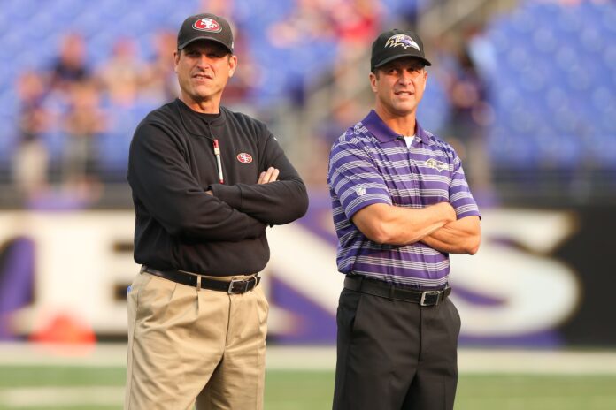 Brothers Jim and John Harbaugh prior to a game.