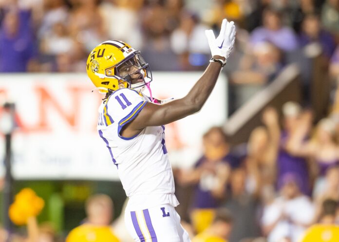 Brian Thomas Jr (11) scores a touchdown as the LSU Tigers take on the the Army Black Knights in Tiger Stadium.