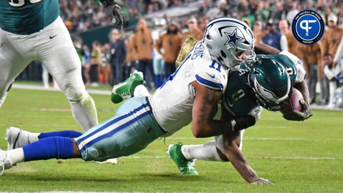 Dallas Cowboys linebacker Micah Parsons (11) stops Philadelphia Eagles running back D'Andre Swift (0) short of the goal line during the second quarter at Lincoln Financial Field.