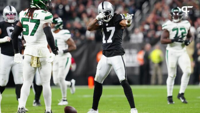 Las Vegas Raiders WR Davante Adams (17) signals a first down after a reception against the New York Jets.