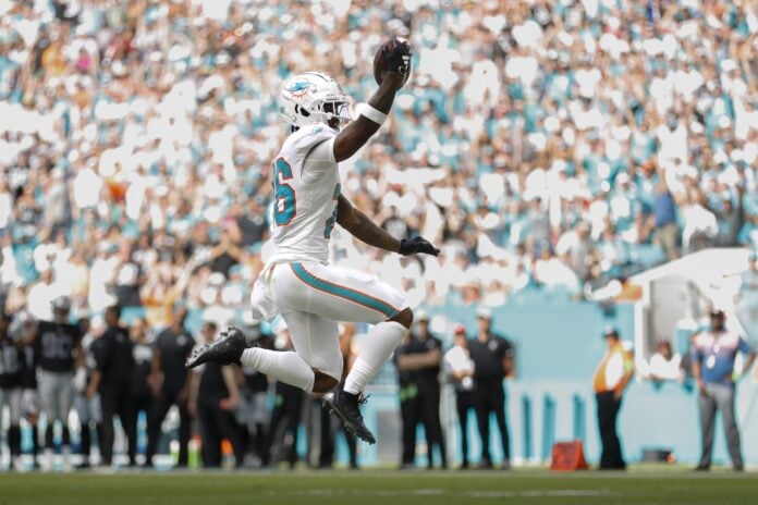Miami Dolphins RB Salvon Ahmed (26) reacts after scoring a touchdown against the Las Vegas Raiders.