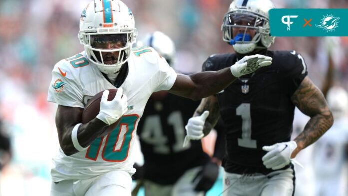 Miami Dolphins WR Tyreek Hill (10) runs after the catch against the Las Vegas Raiders.