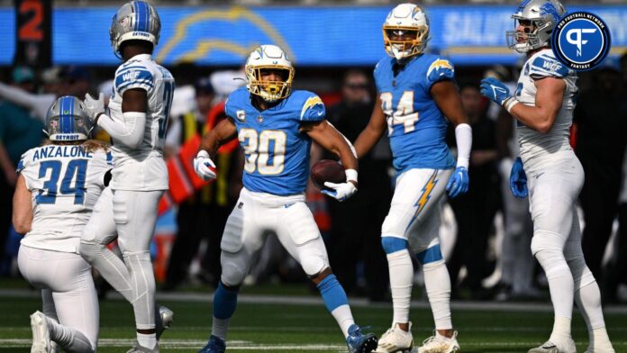 Los Angeles Chargers running back Austin Ekeler (30) reacts after a first down against the Detroit Lions during the first half at SoFi Stadium.
