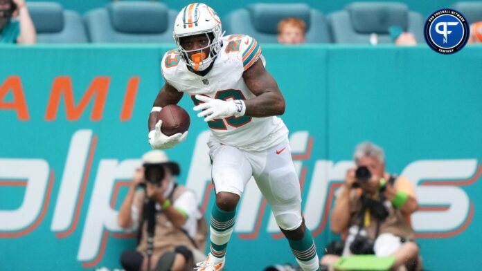 Miami Dolphins running back Jeff Wilson Jr. (23) runs the ball against the New England Patriots during the second half at Hard Rock Stadium.