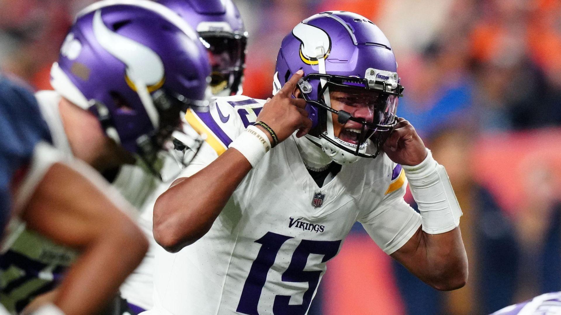 Minnesota Viking quarterback Joshua Dobbs (15) reacts against the Denver Broncos in the fourth quarter at Empower Field at Mile High.