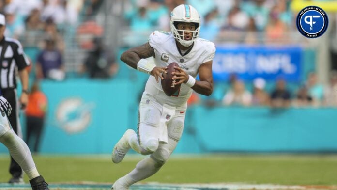Miami Dolphins QB Tua Tagovailoa (1) runs with the ball against the Las Vegas Raiders.