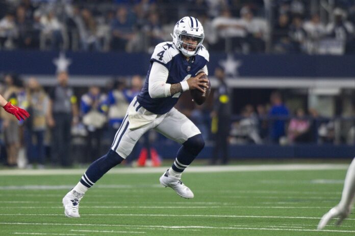 Dallas Cowboys quarterback Dak Prescott (4) in action during the game between the Dallas Cowboys and the New York Giants at AT&T Stadium.