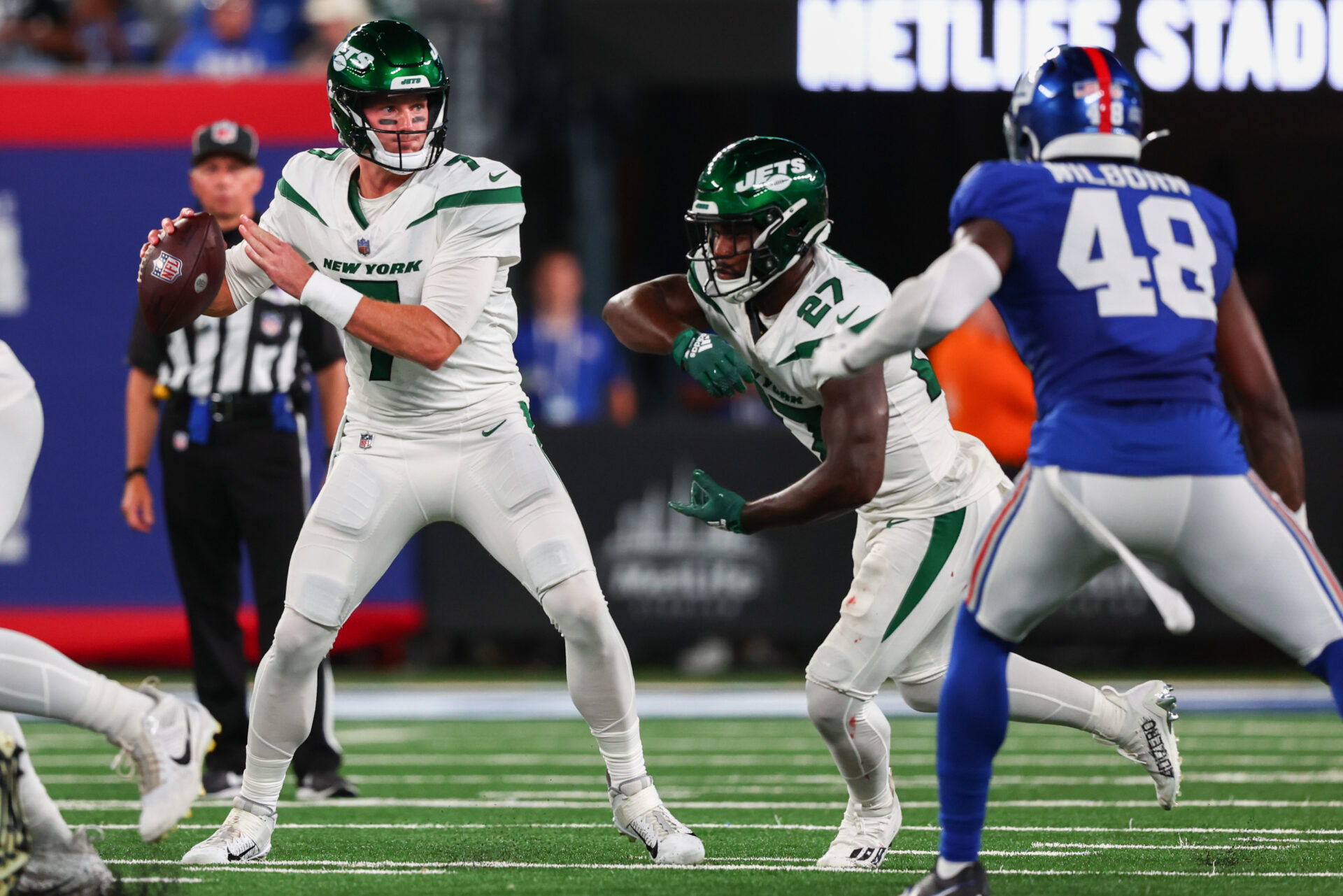 New York Jets quarterback Tim Boyle (7) throws a pass against the New York Giants during the second half at MetLife Stadium.