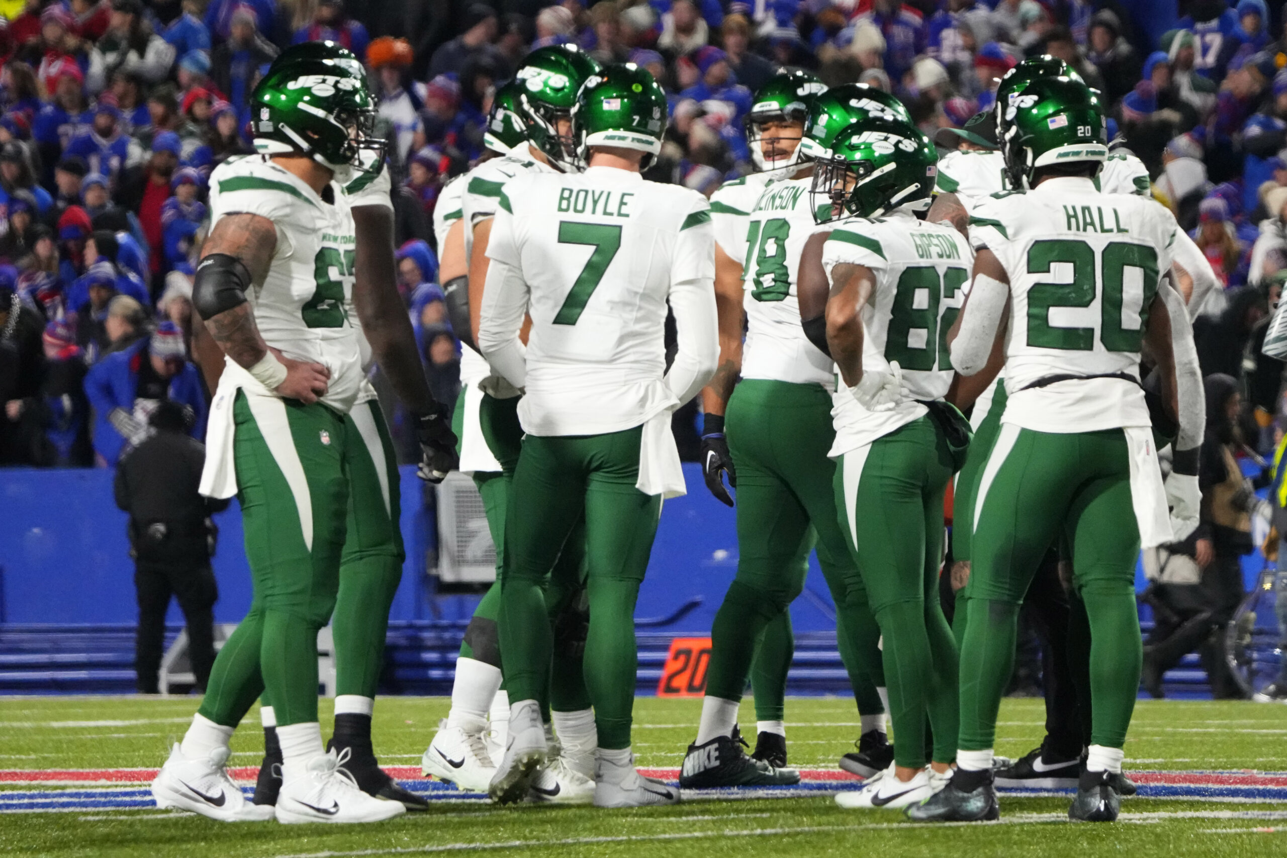 New York Jets quarterback Tim Boyle (7) in the huddle calling the play against the Buffalo Bills during the second half at Highmark Stadium.