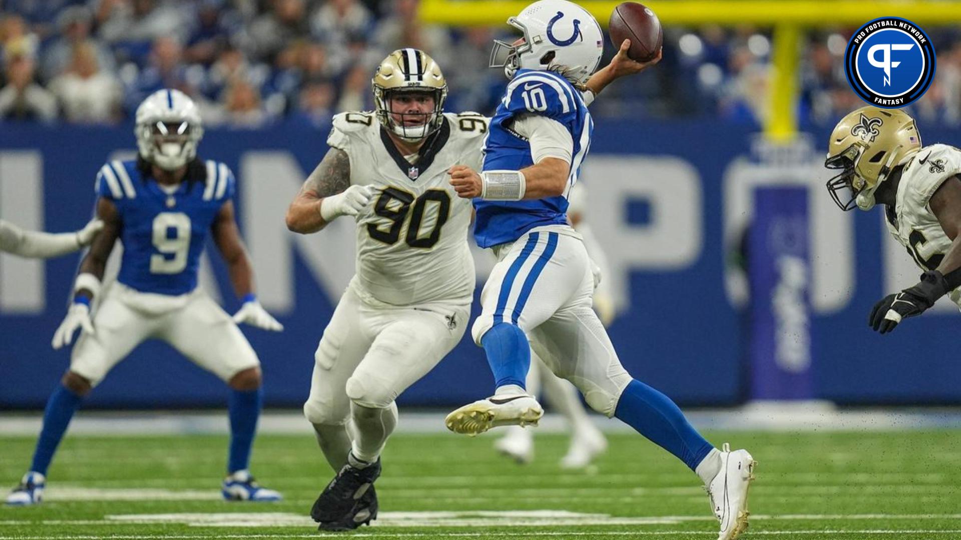 Indianapolis Colts quarterback Gardner Minshew II (10) gets rid of the ball under pressure from Saints defense Sunday, Oct. 29, 2023, at Lucas Oil Stadium in Indianapolis. The Colts lost to the Saints, 38-27.