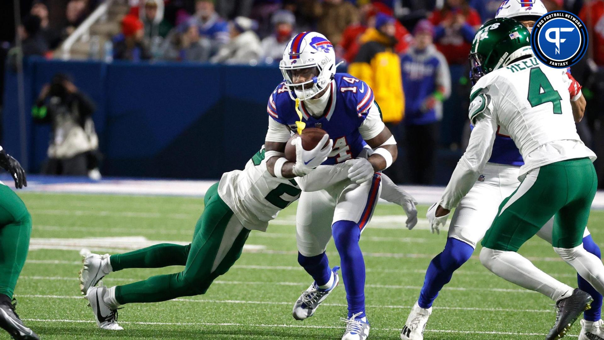 Buffalo Bills wide receiver Stefon Diggs (14) is tackled after a catch against the Jets.