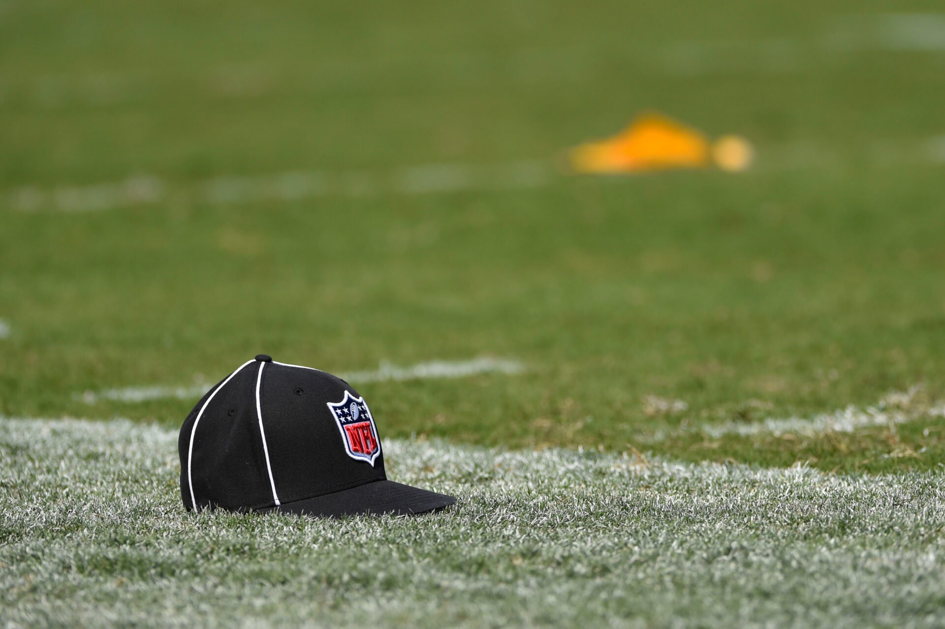 Why Do NFL Officials Throw Their Hats?