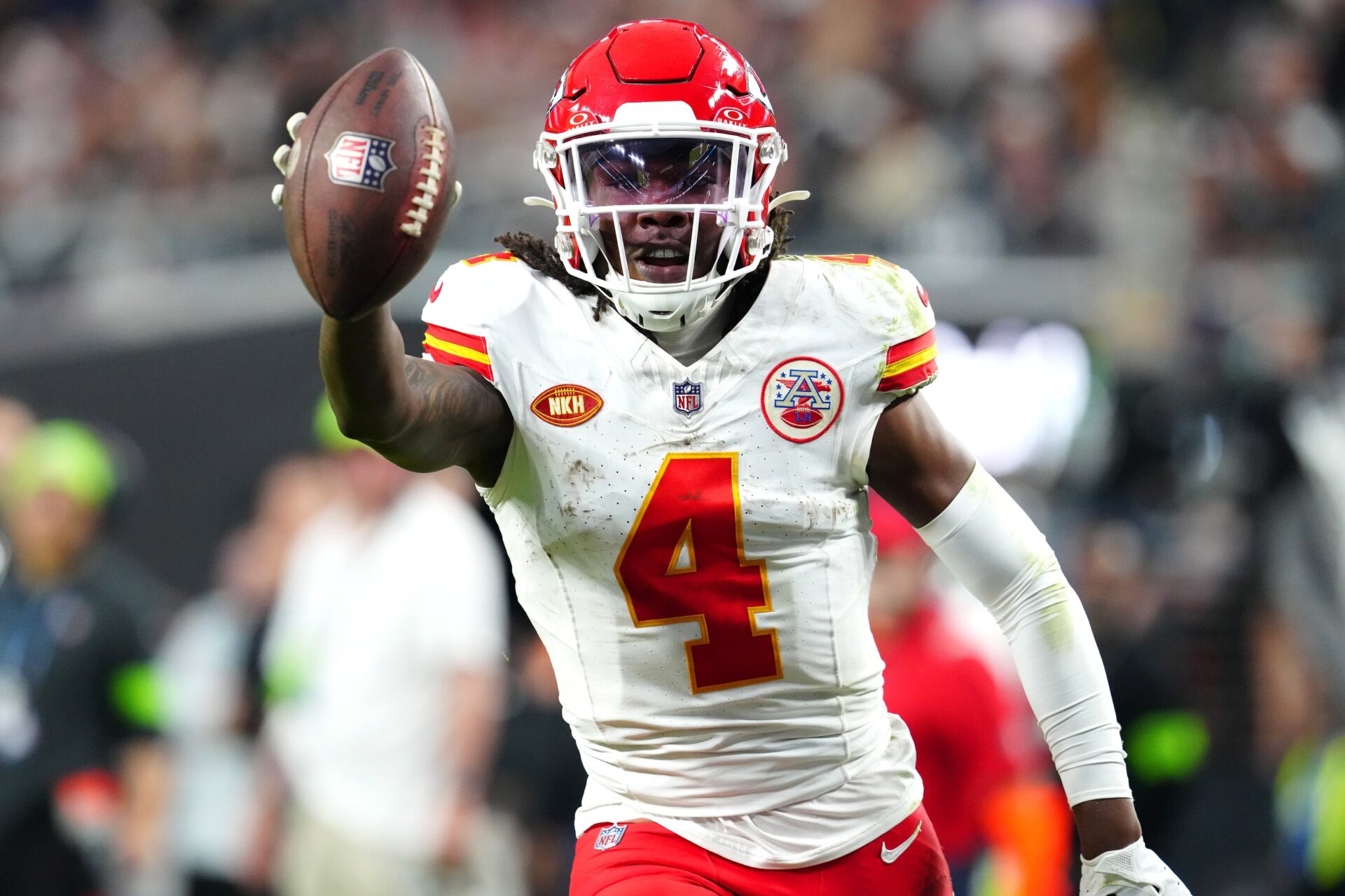 Kansas City Chiefs wide receiver Rashee Rice (4) celebrates after scoring a touchdown against the Las Vegas Raiders during the fourth quarter at Allegiant Stadium.
