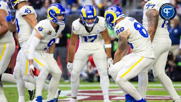 Los Angeles Rams tight end Tyler Higbee (89) celebrates a touchdown with wide receiver Puka Nacua (17) and quarterback Matthew Stafford (9) against the Arizona Cardinals in the first half at State Farm Stadium.