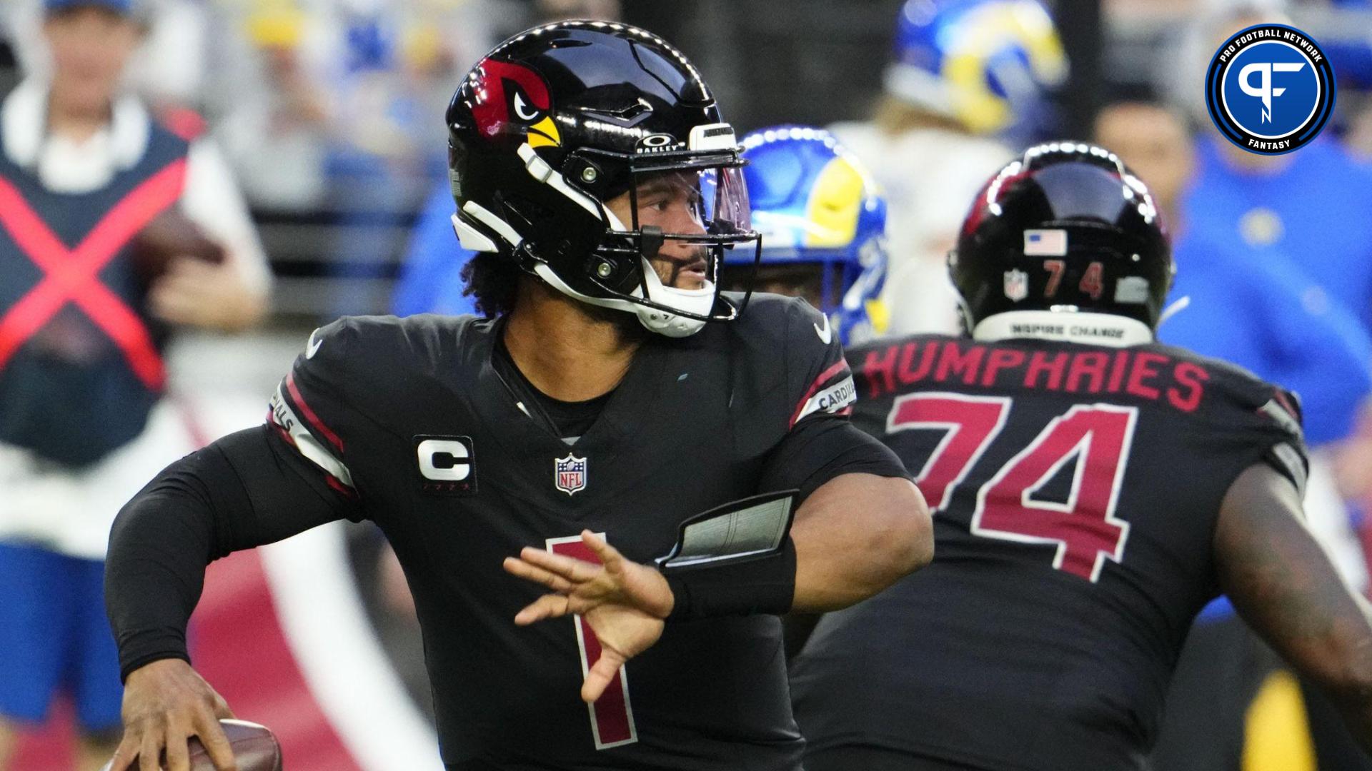 Arizona Cardinals quarterback Kyler Murray (1) throws a pass against the Los Angeles Rams in the second half at State Farm Stadium in Glendale on Nov. 26, 2023.