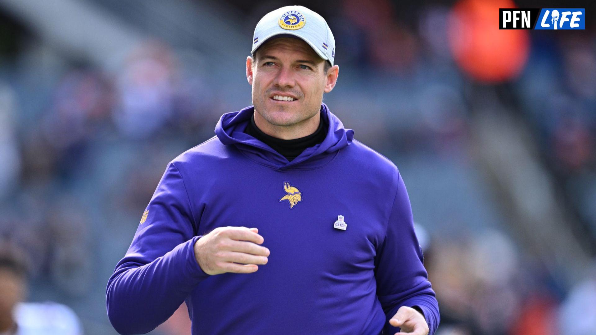 Minnesota Vikings head coach Kevin O'Connell runs off the field after pregame warmups before a game against the Chicago Bears at Soldier Field.