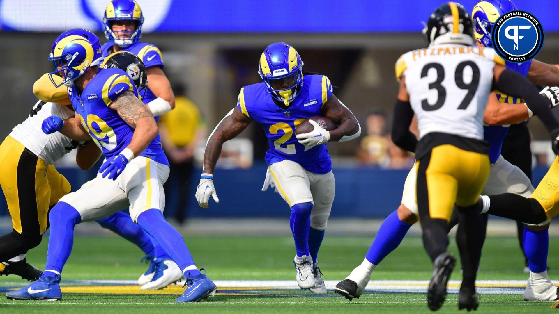 Los Angeles Rams running back Royce Freeman (24) runs the ball against the Pittsburgh Steelers during the first half at SoFi Stadium.