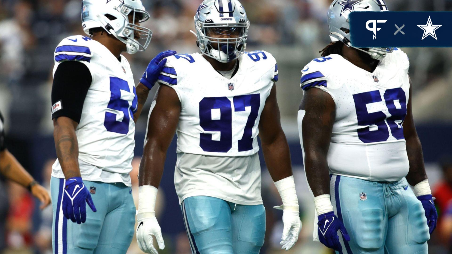 Dallas Cowboys defensive tackle Osa Odighizuwa (97) and defensive tackle Mazi Smith (58) on the field in the game against the Jacksonville Jaguars at AT&T Stadium.
