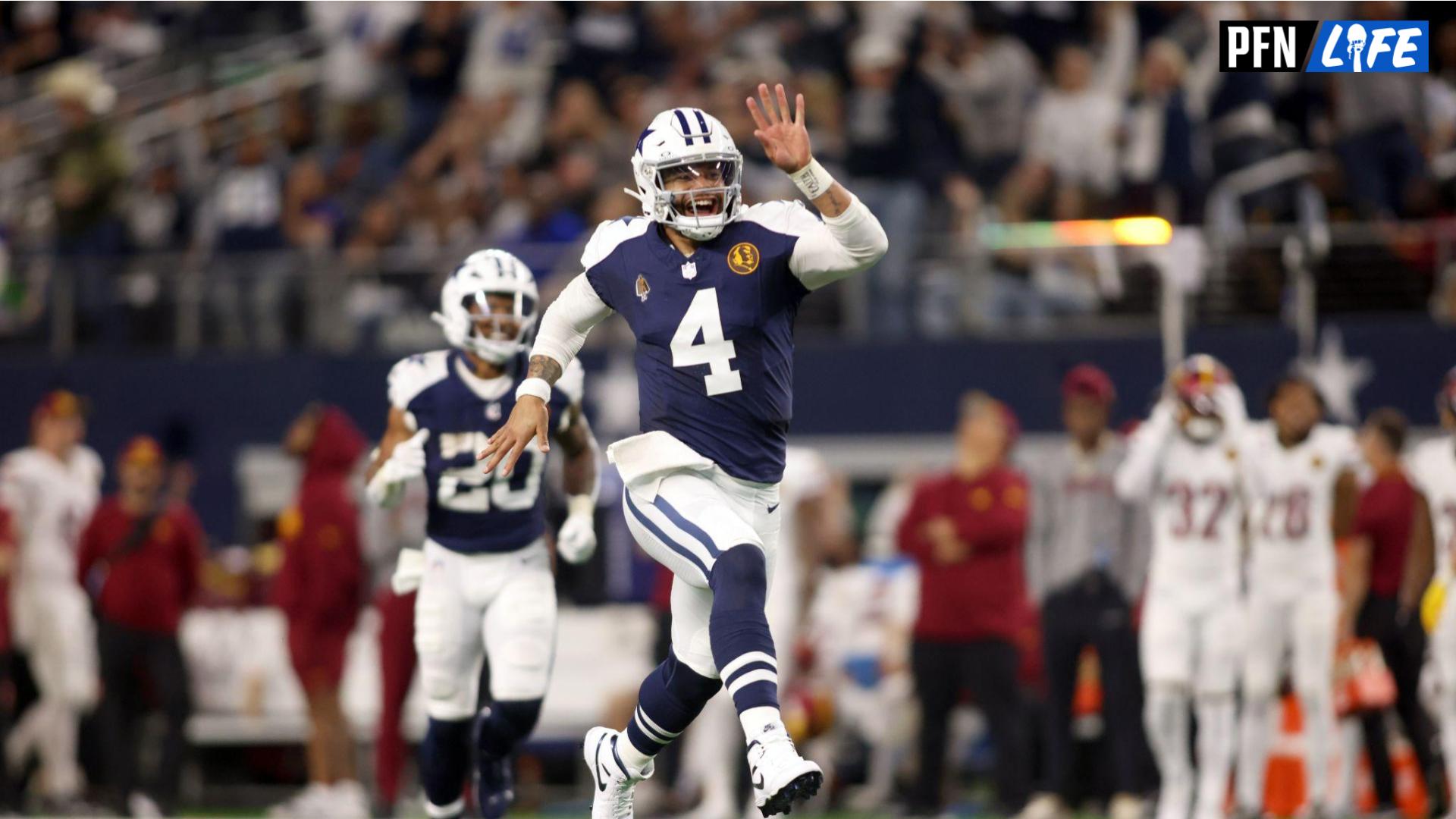 Dallas Cowboys quarterback Dak Prescott (4) celebrates throwing a touchdown in the fourth quarter against the Washington Commanders at AT&T Stadium.