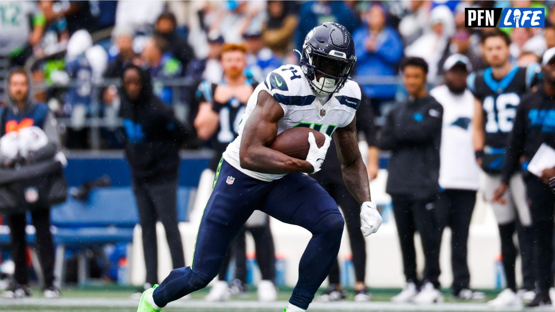 Seattle Seahawks wide receiver DK Metcalf (14) runs for yards after the catch against the Carolina Panthers during the second quarter at Lumen Field.