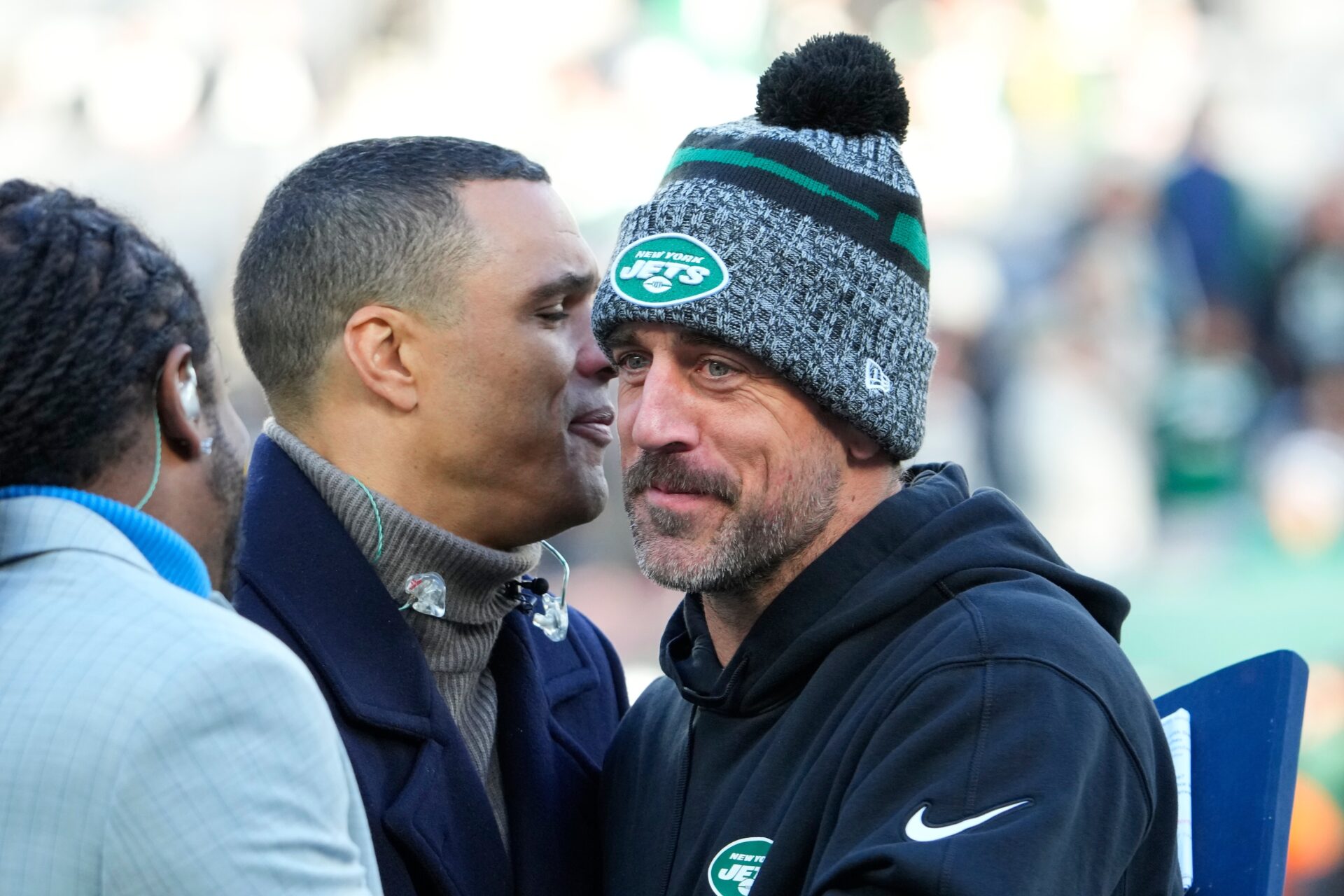 New York Jets QB Aaron Rodgers (8), on injured reserve, with broadcaster Tony Gonzalez, pregame against the Miami Dolphins.